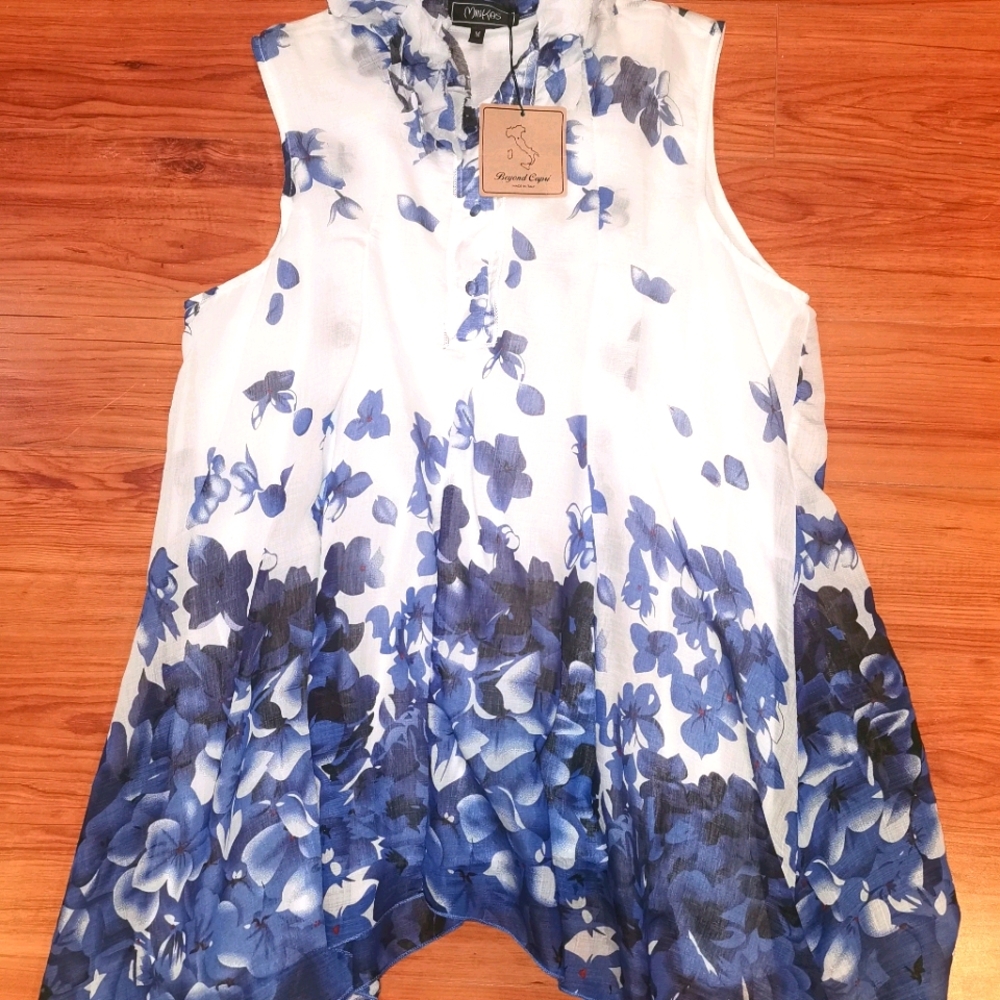 Elegant blouse made in Italy.   3/$60